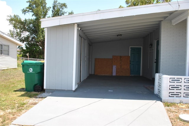 21275 Austin Ave, Port Charlotte, FL 33952 - view of vehicle parking featuring driveway and an attached carport