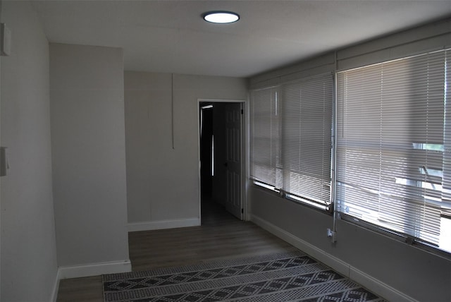 21275 Austin Ave, Port Charlotte, FL 33952 - hallway with baseboards, wood finished floors, and recessed lighting