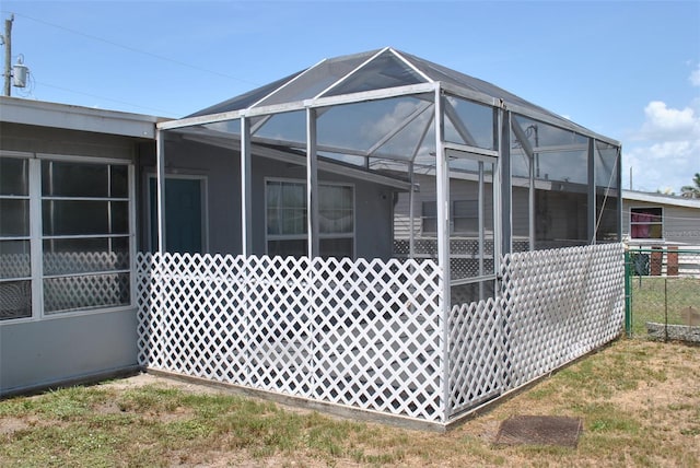 21275 Austin Ave, Port Charlotte, FL 33952 - view of side of property with glass enclosure