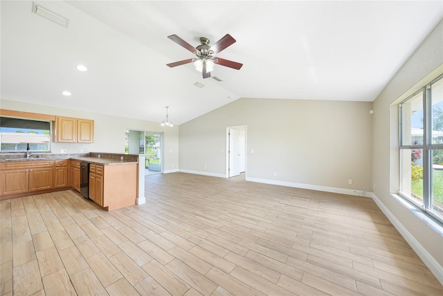 11615 SW Pine Ave, Arcadia, FL 34269 - kitchen with a sink, baseboards, ceiling fan, a peninsula, and vaulted ceiling