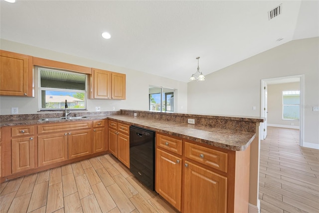 11615 SW Pine Ave, Arcadia, FL 34269 - kitchen with black dishwasher, a sink, a peninsula, wood finish floors, and lofted ceiling