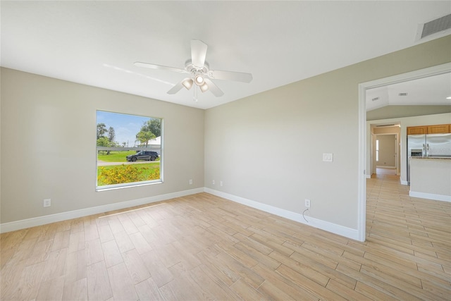 11615 SW Pine Ave, Arcadia, FL 34269 - unfurnished room with a ceiling fan, light wood-style floors, and baseboards