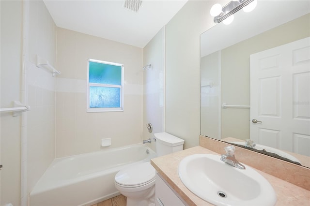 11615 SW Pine Ave, Arcadia, FL 34269 - full bath with vanity, toilet, bathtub / shower combination, and wood finished floors