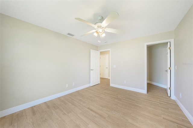 11615 SW Pine Ave, Arcadia, FL 34269 - unfurnished bedroom featuring light wood-type flooring, baseboards, and a ceiling fan