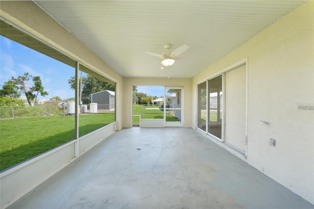 11615 SW Pine Ave, Arcadia, FL 34269 - unfurnished sunroom featuring a ceiling fan