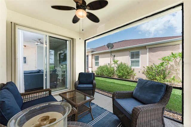 8866 Tuscany Isles Dr, Punta Gorda, FL 33950 - sunroom / solarium featuring a ceiling fan