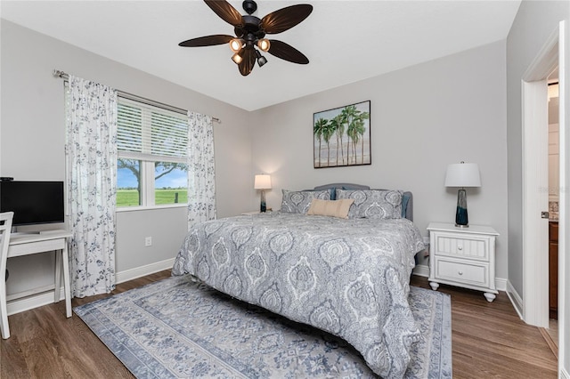 8866 Tuscany Isles Dr, Punta Gorda, FL 33950 - bedroom featuring wood finished floors, baseboards, and a ceiling fan