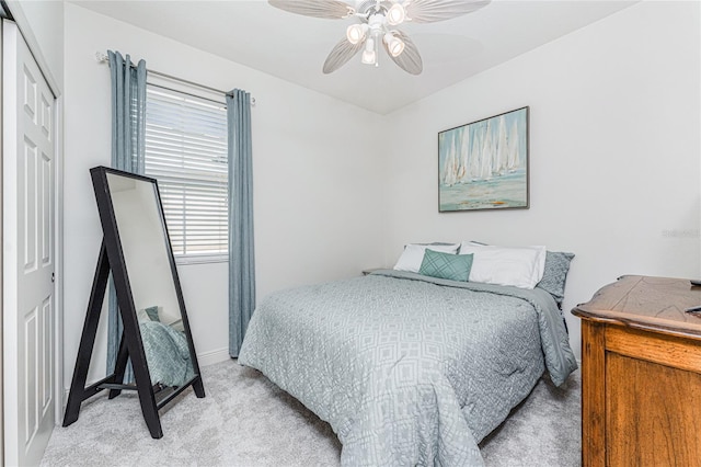 8866 Tuscany Isles Dr, Punta Gorda, FL 33950 - bedroom with light carpet, ceiling fan, baseboards, and a closet