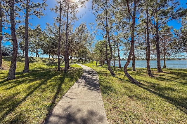 8866 Tuscany Isles Dr, Punta Gorda, FL 33950 - view of property's community with a yard and a water view