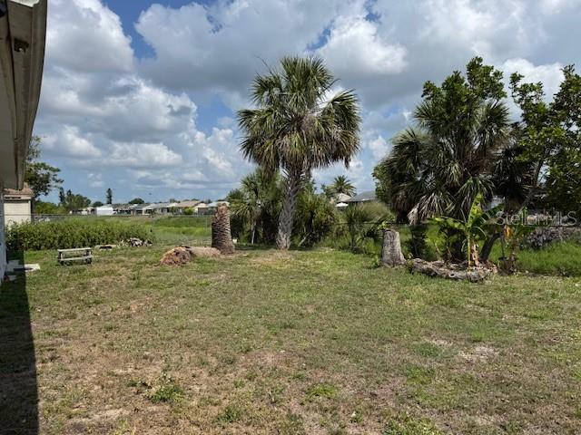 8158 Trionfo Ave, North Port, FL 34287 - view of green lawn