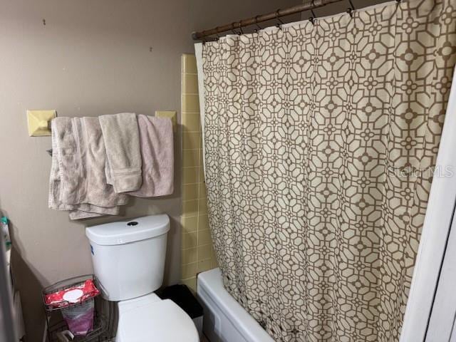 8158 Trionfo Ave, North Port, FL 34287 - full bath featuring toilet and shower / bathtub combination with curtain