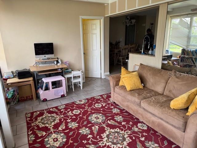 8158 Trionfo Ave, North Port, FL 34287 - view of tiled living room