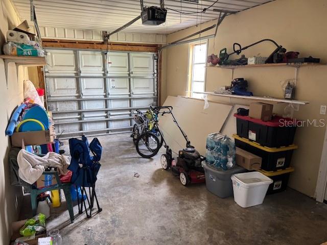 8158 Trionfo Ave, North Port, FL 34287 - garage featuring a garage door opener