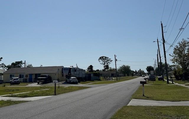 8158 Trionfo Ave, North Port, FL 34287 - view of asphalt street with street lighting