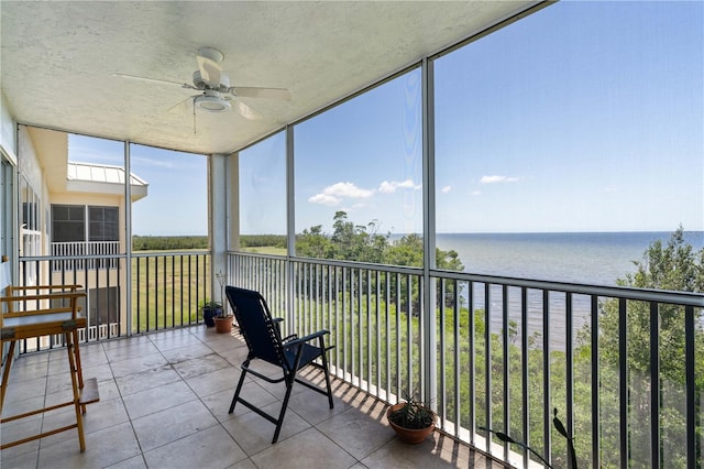 101 N Marion Ct Unit 133, Punta Gorda, FL 33950 - sunroom / solarium featuring a ceiling fan and a water view
