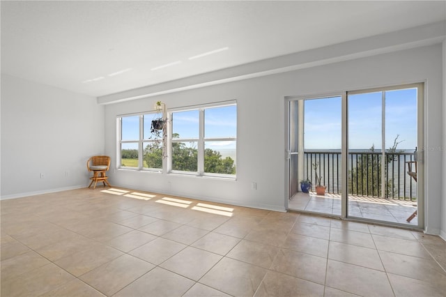 101 N Marion Ct Unit 133, Punta Gorda, FL 33950 - spare room with light tile patterned floors and baseboards