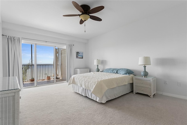 101 N Marion Ct Unit 133, Punta Gorda, FL 33950 - bedroom with access to exterior, carpet, baseboards, and ceiling fan