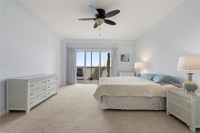 101 N Marion Ct Unit 133, Punta Gorda, FL 33950 - bedroom featuring access to exterior, carpet floors, baseboards, and a ceiling fan