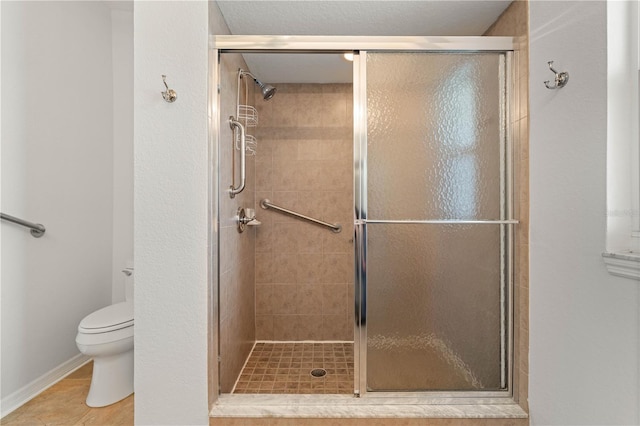 101 N Marion Ct Unit 133, Punta Gorda, FL 33950 - full bathroom featuring a shower stall, toilet, and baseboards