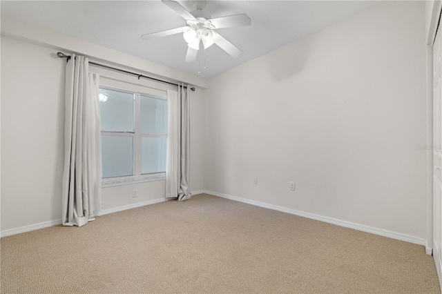 101 N Marion Ct Unit 133, Punta Gorda, FL 33950 - unfurnished room with light colored carpet, baseboards, and a ceiling fan