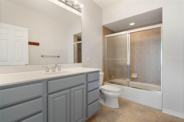 101 N Marion Ct Unit 133, Punta Gorda, FL 33950 - bathroom featuring vanity, toilet, and shower / bath combination with glass door