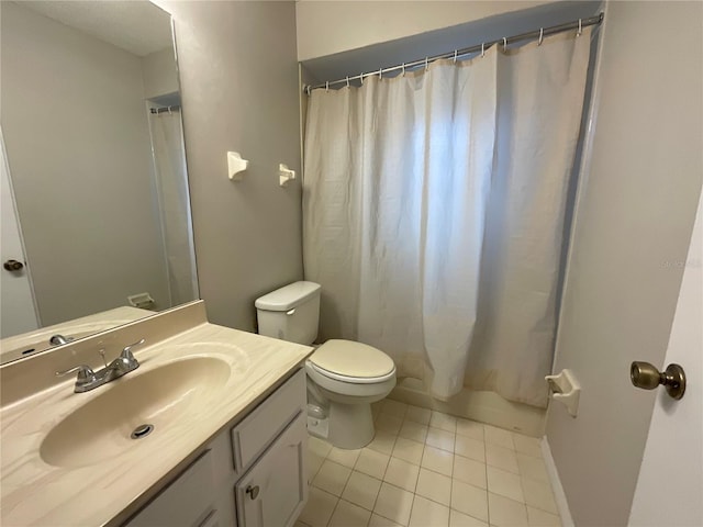41 Brewster Ln, Palm Coast, FL 32137 - bathroom with vanity, tile patterned floors, toilet, and a shower with curtain