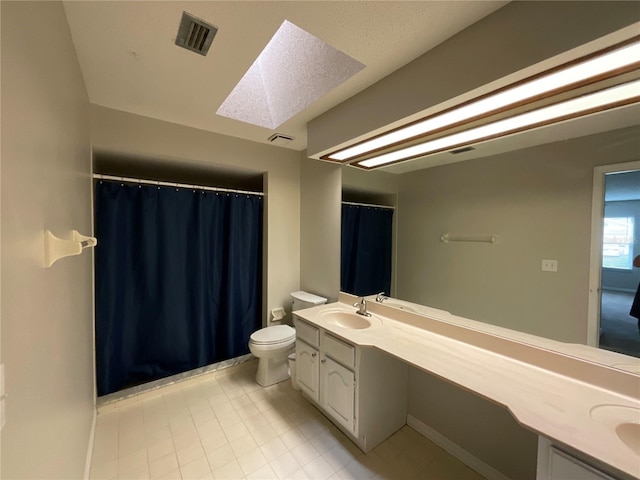 41 Brewster Ln, Palm Coast, FL 32137 - full bathroom with a skylight, vanity, toilet, tile patterned floors, and curtained shower