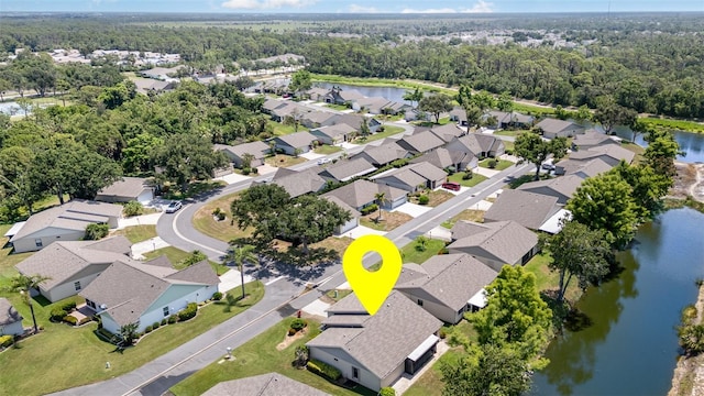 541 Wekiva River Ct Unit 94, Englewood, FL 34223 - aerial perspective of suburban area with a large body of water and a heavily wooded area