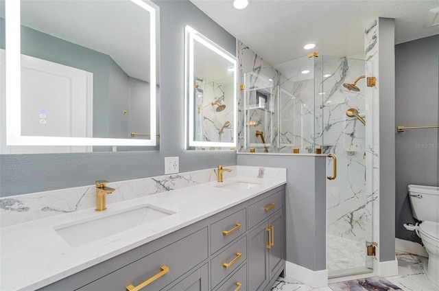 541 Wekiva River Ct Unit 94, Englewood, FL 34223 - bathroom featuring toilet, marble finish floors, double vanity, recessed lighting, and a marble finish shower