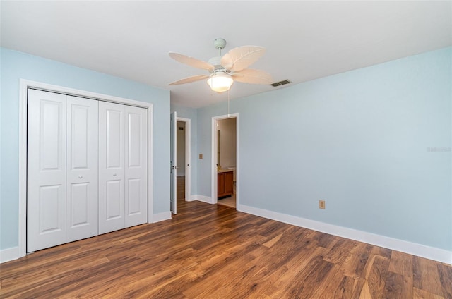 541 Wekiva River Ct Unit 94, Englewood, FL 34223 - unfurnished bedroom featuring wood finished floors, baseboards, a closet, and a ceiling fan