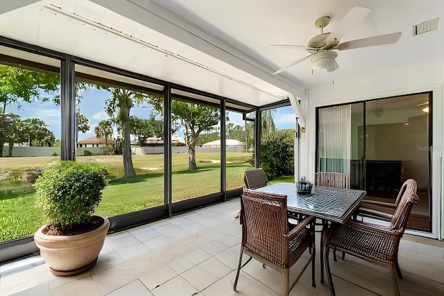 541 Wekiva River Ct Unit 94, Englewood, FL 34223 - sunroom / solarium featuring ceiling fan and outdoor dining space