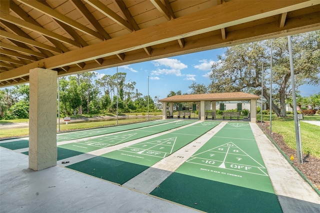 541 Wekiva River Ct Unit 94, Englewood, FL 34223 - view of community with a gazebo and shuffleboard
