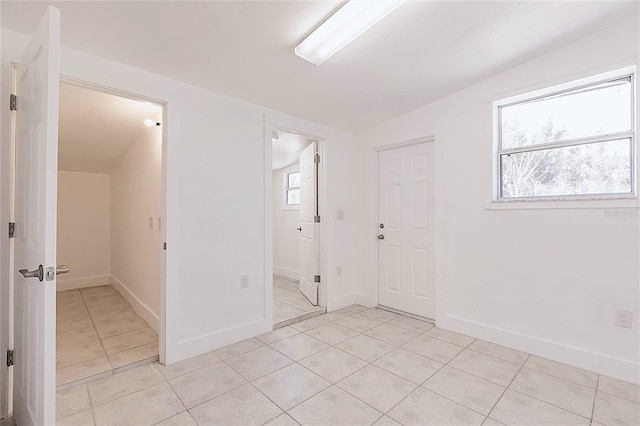 3129 Buttonwood Pl, Punta Gorda, FL 33950 - unfurnished room with light tile patterned floors and baseboards