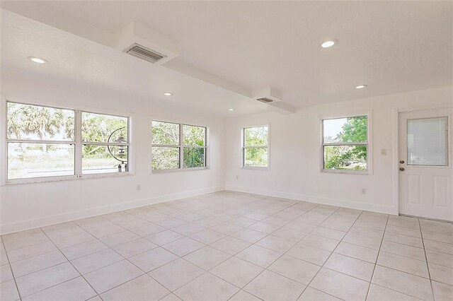 3129 Buttonwood Pl, Punta Gorda, FL 33950 - empty room with light tile patterned flooring, recessed lighting, and baseboards