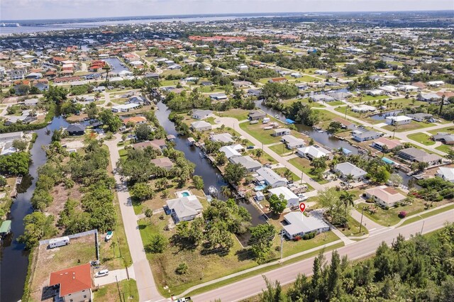 3129 Buttonwood Pl, Punta Gorda, FL 33950 - aerial view of property's location with a large body of water and nearby suburban area