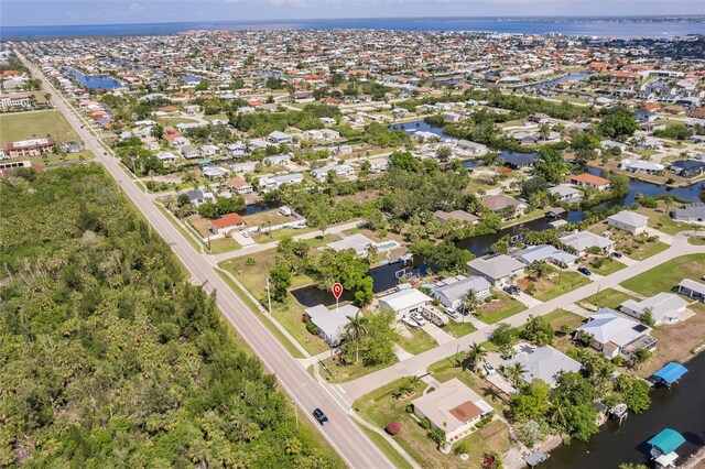 3129 Buttonwood Pl, Punta Gorda, FL 33950 - aerial perspective of suburban area with a large body of water