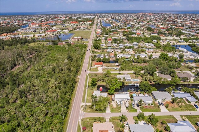3129 Buttonwood Pl, Punta Gorda, FL 33950 - aerial view of property and surrounding area with nearby suburban area and a nearby body of water