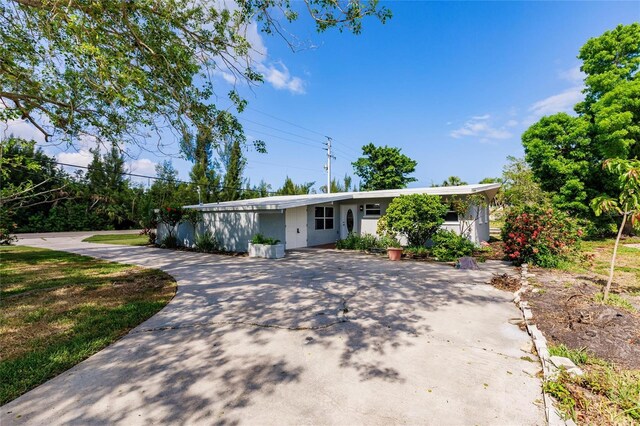 3129 Buttonwood Pl, Punta Gorda, FL 33950 - view of front of property with driveway