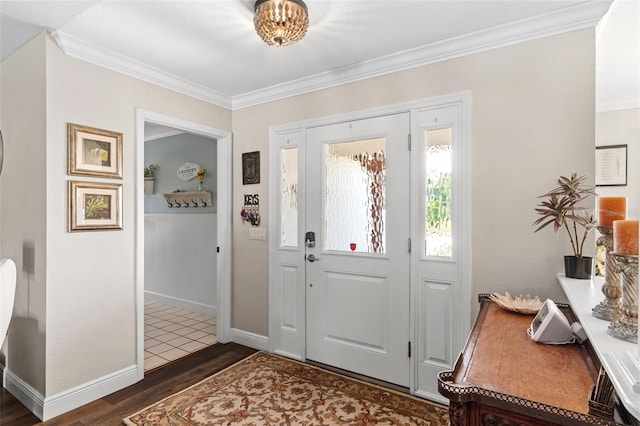 425 Corrientes Cir, Punta Gorda, FL 33983 - entryway featuring ornamental molding, wood finished floors, and baseboards