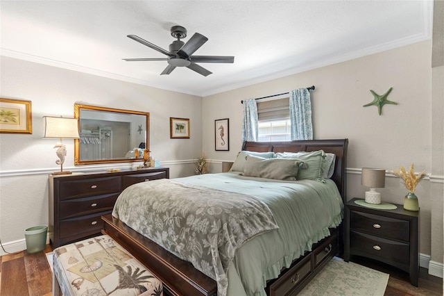 425 Corrientes Cir, Punta Gorda, FL 33983 - bedroom featuring crown molding, wood finished floors, baseboards, and a ceiling fan