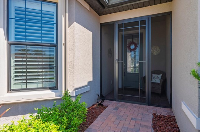 1470 Hyssop Loop, North Port, FL 34289 - view of exterior entry with stucco siding