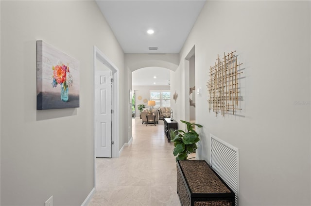 1470 Hyssop Loop, North Port, FL 34289 - corridor featuring arched walkways, baseboards, and recessed lighting
