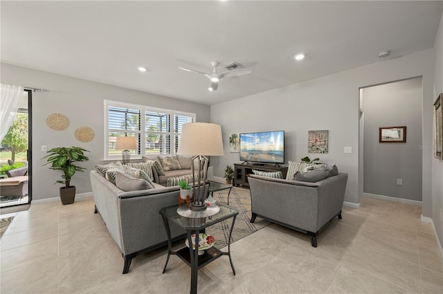 1470 Hyssop Loop, North Port, FL 34289 - living room with ceiling fan, recessed lighting, baseboards, and light tile patterned floors