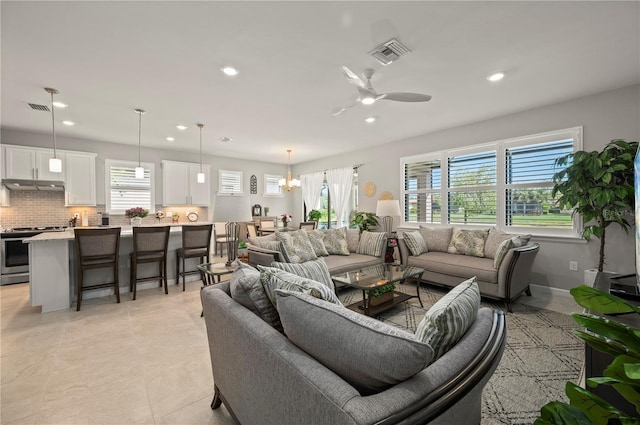 1470 Hyssop Loop, North Port, FL 34289 - living area with ceiling fan, recessed lighting, and light tile patterned floors