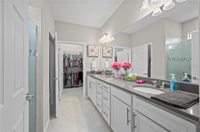 1470 Hyssop Loop, North Port, FL 34289 - bathroom with double vanity, a stall shower, and a walk in closet