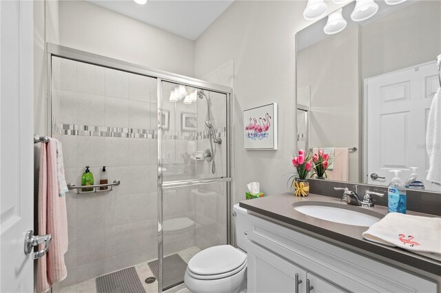1470 Hyssop Loop, North Port, FL 34289 - full bathroom featuring vanity, a stall shower, and toilet