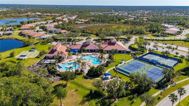 1470 Hyssop Loop, North Port, FL 34289 - aerial view of residential area featuring a pool area and a large body of water