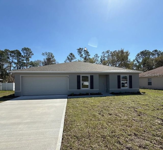 42 Peppercorn Ln, Palm Coast, FL 32164 - ranch-style home featuring driveway, an attached garage, and stucco siding
