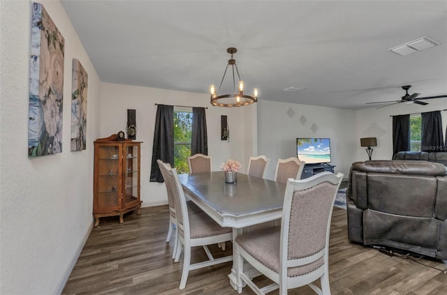 3799 Laredo Ave, North Port, FL 34288 - dining area with wood finished floors, a chandelier, baseboards, and ceiling fan