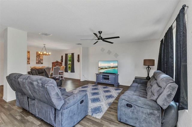 3799 Laredo Ave, North Port, FL 34288 - living room with a chandelier, wood finished floors, a ceiling fan, and baseboards